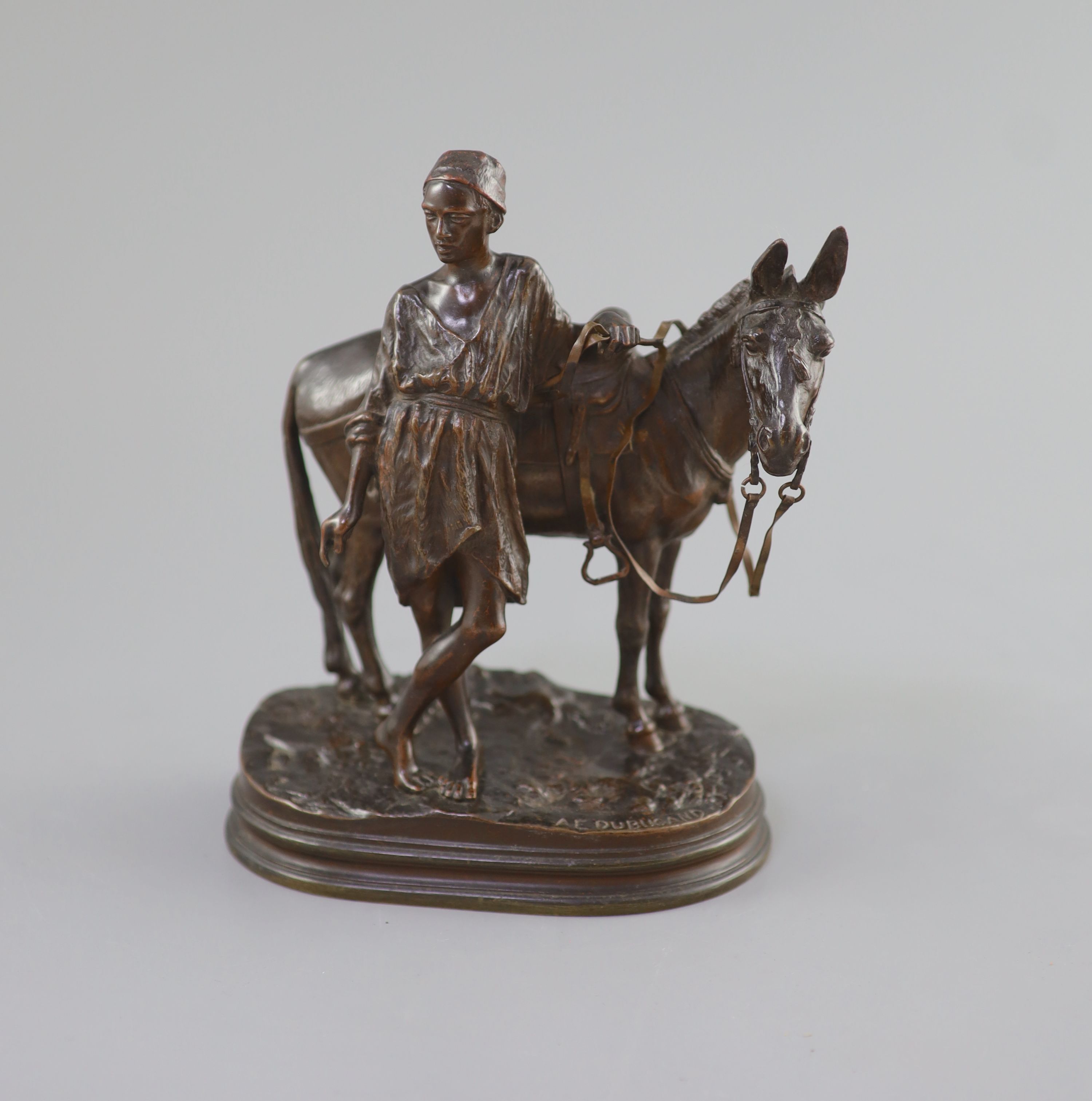 Alfred E. Dubucand (1828-1894) a bronze of a North African boy and donkey 18cm high